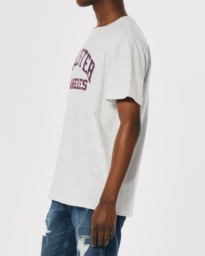 educación física Hollister camiseta holgada con gráfico del logo del equipo universitario gris jaspeado claro 086N621078 hombres tapas